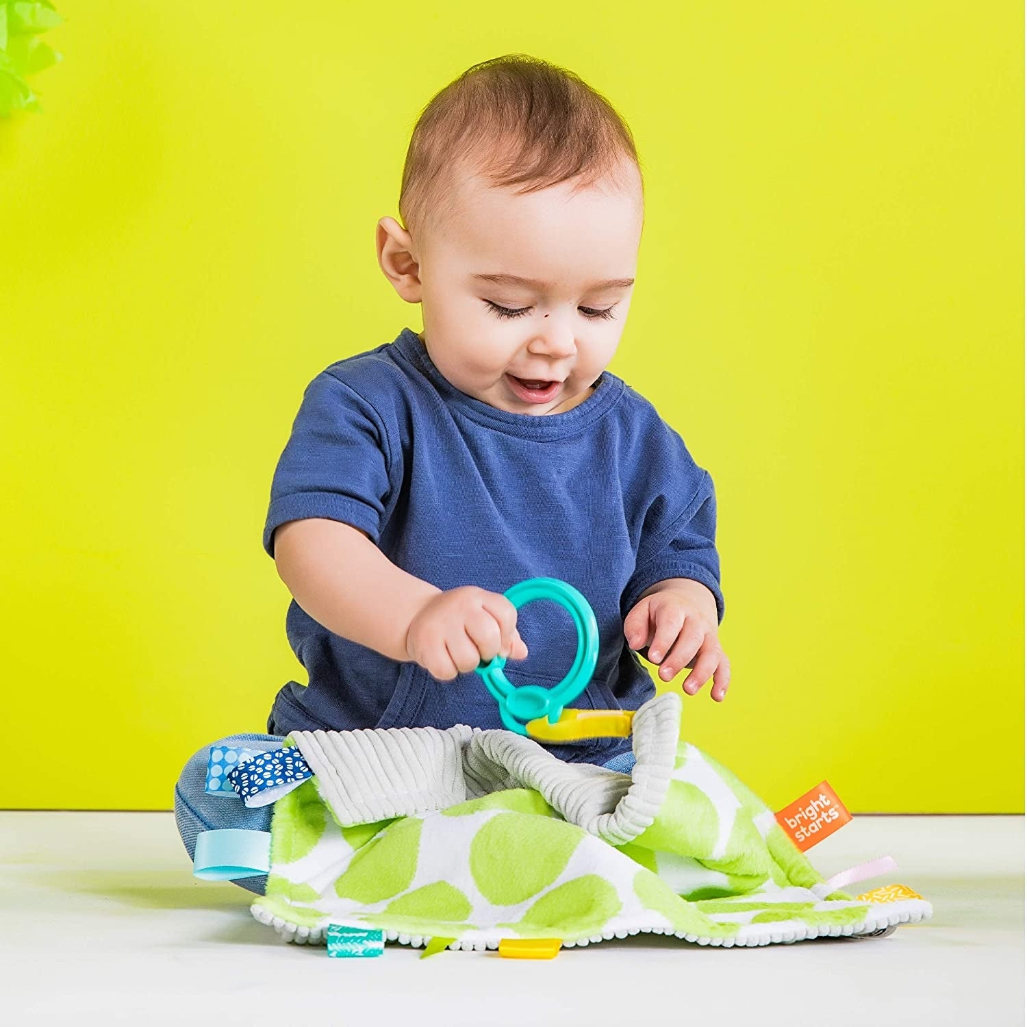 Bright Starts - Paturica vesela Little Taggies cu buline verzi