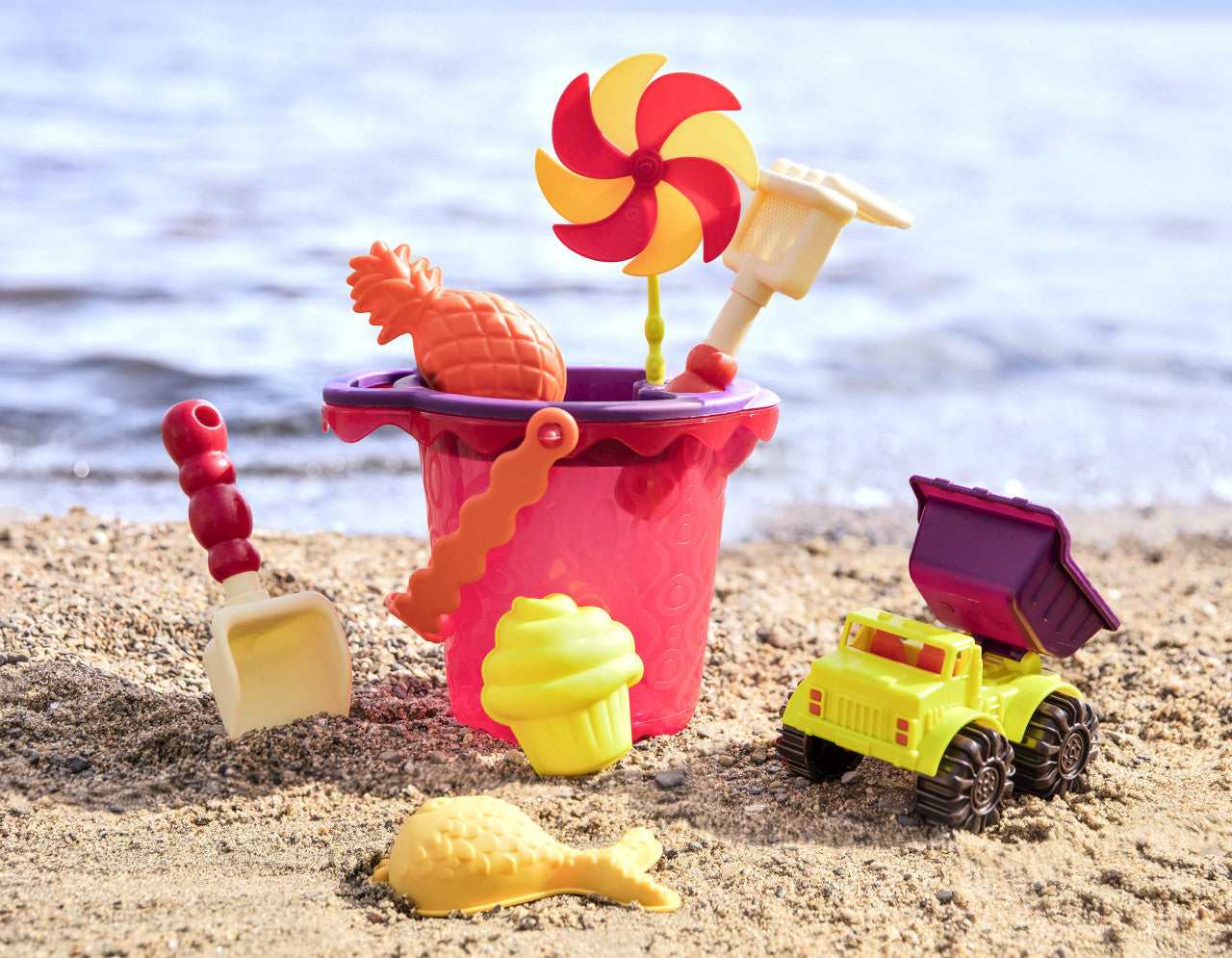 Red B.Toys Bucket with 9 Sand Toys